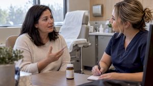Patient discusses arnica supplement with cosmetic nurse